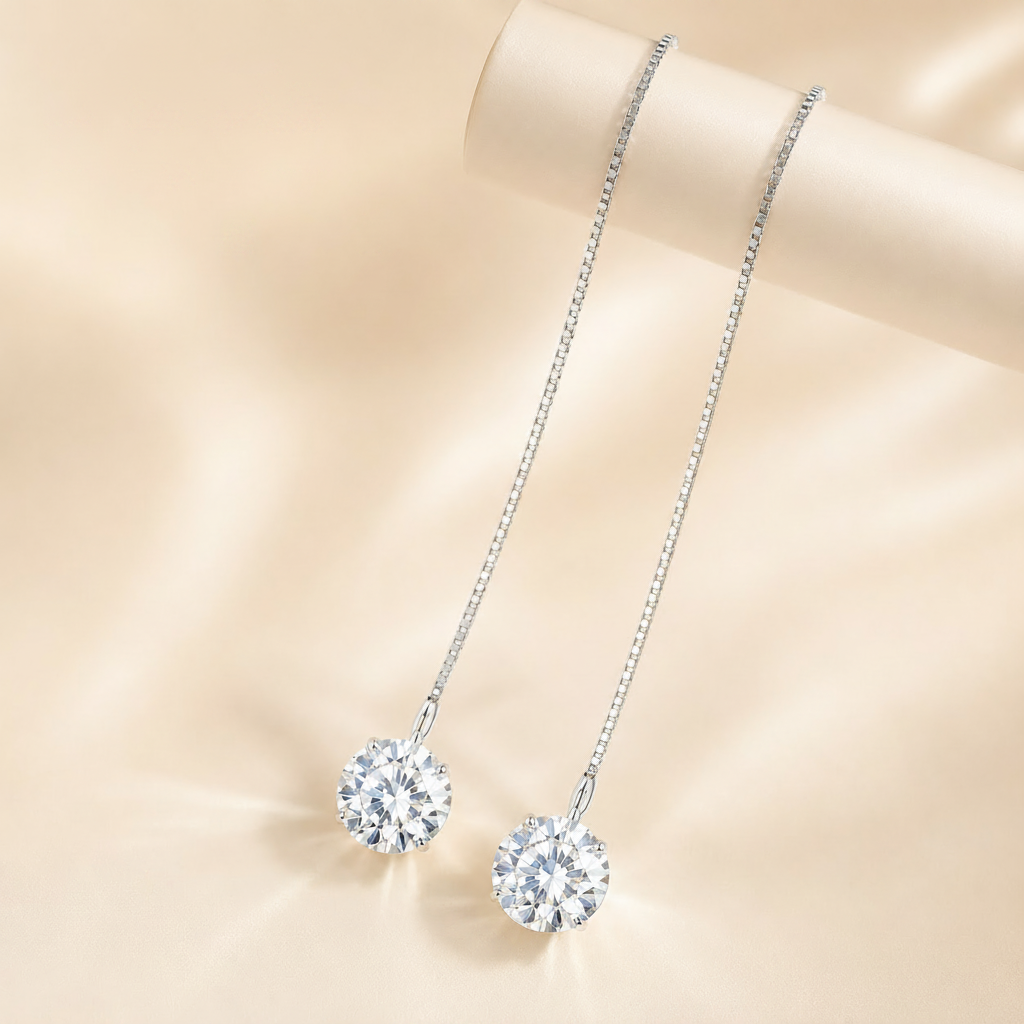 Silver necklace with round pendant on a beige background, featuring Luvora brand.