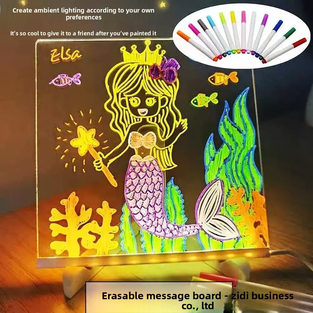 Mermaid-themed LED sign with colorful markers on a dark background