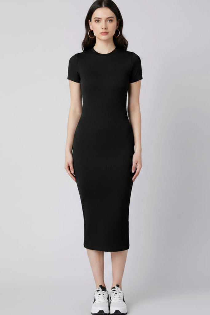 Woman wearing a black dress on a gray background