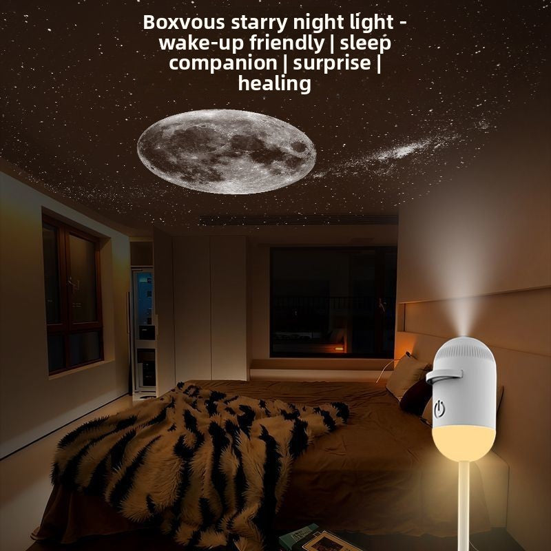 Bedroom with starry night light projector projecting a moon and stars on the ceiling.