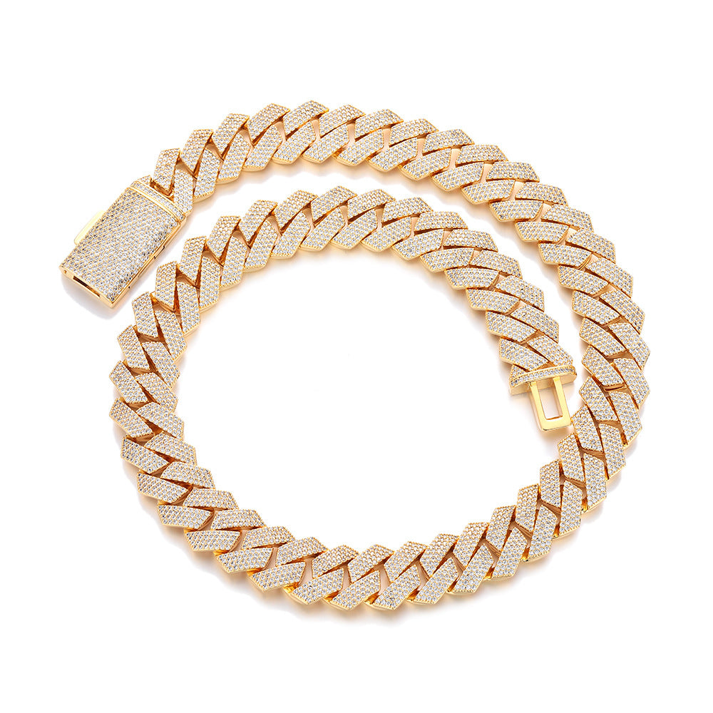 Gold chain necklace on a white background