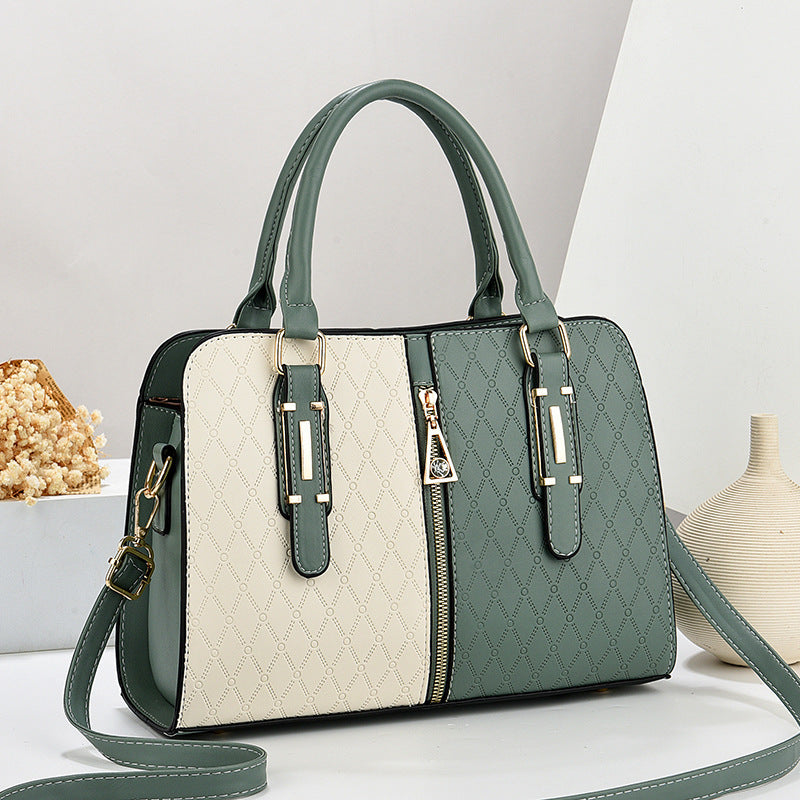 Green and white handbag with quilted design on a light background