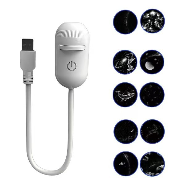 White night light with USB cable and star patterned lenses on a white background