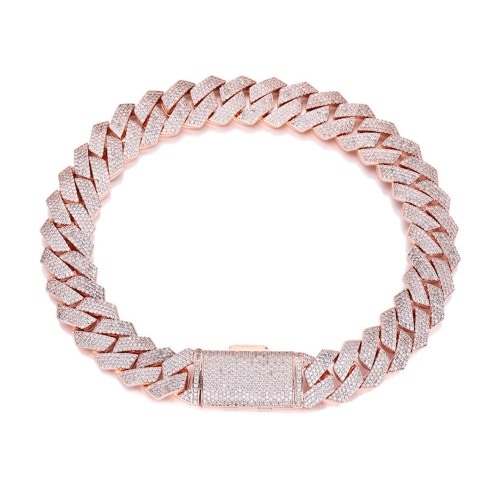 Rose gold bracelet with diamond accents on a white background