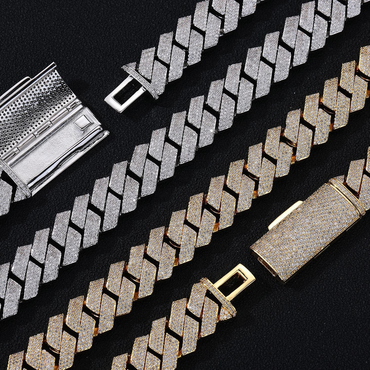 Gold and silver chain necklaces on a black background