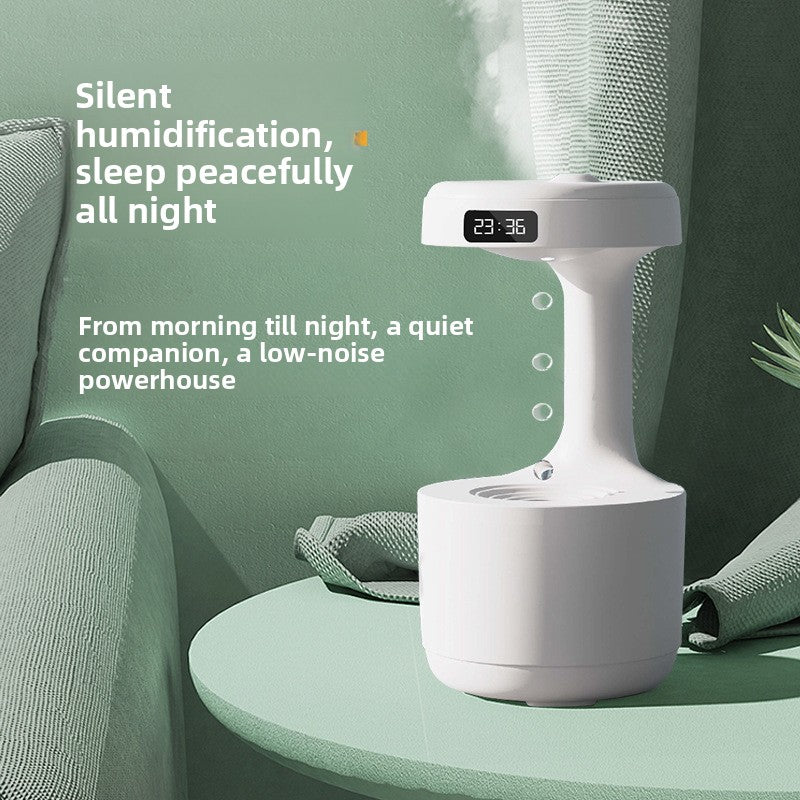 White humidifier on a green table with text about silent humidification and sleep quality.