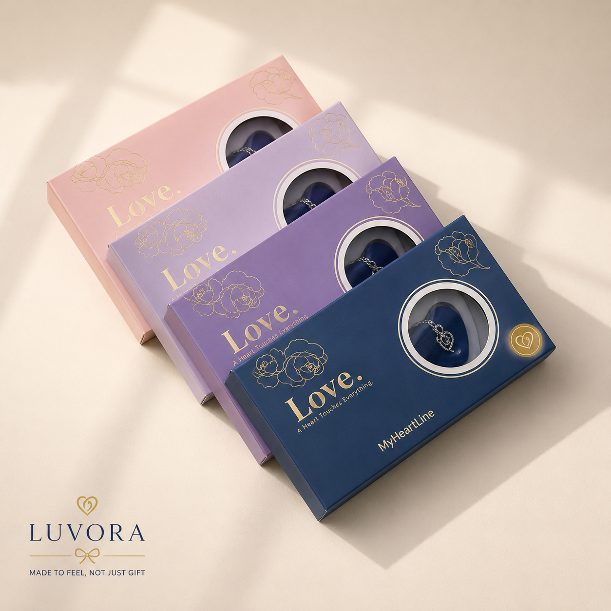 Three jewelry boxes in pink, purple, and blue with 'Love' text on a light background, featuring the Luvora brand.