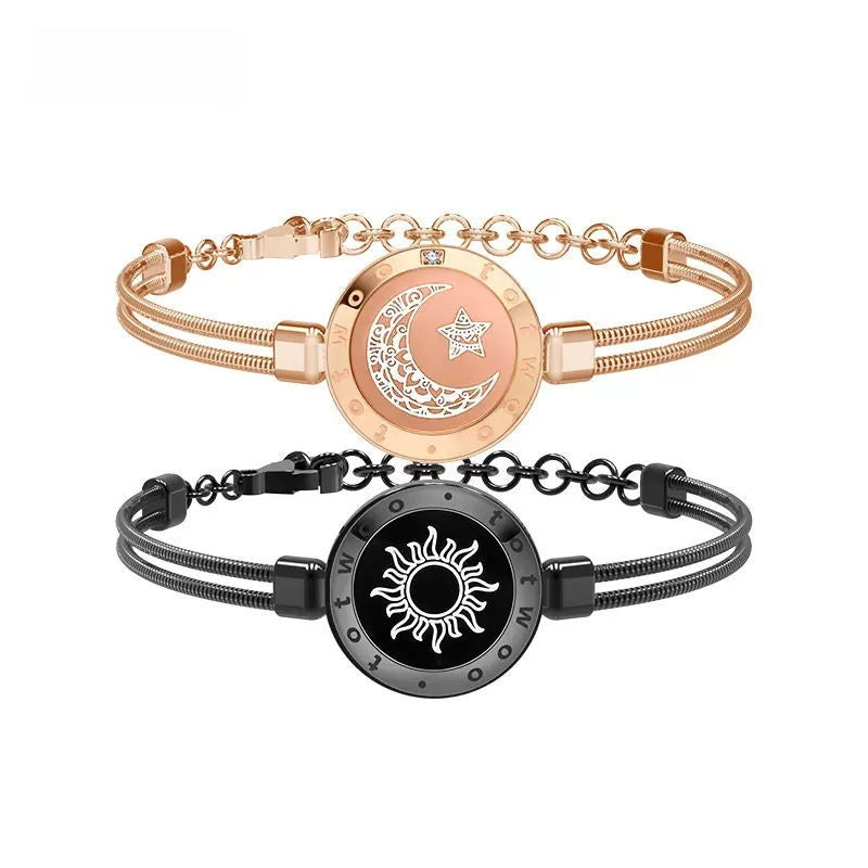 Two bracelets, one rose gold and one black, with circular designs featuring celestial symbols on a white background.