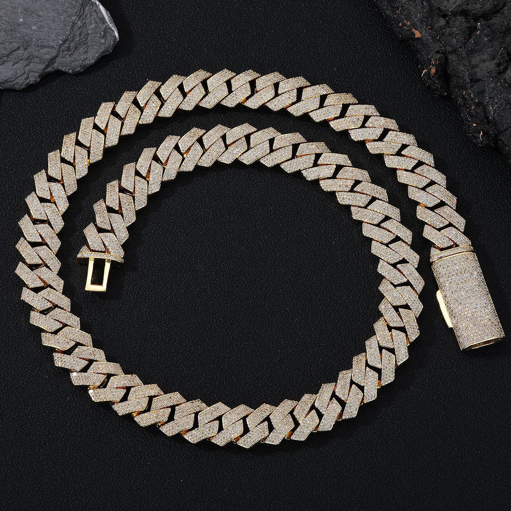 Gold chain bracelet on a black background