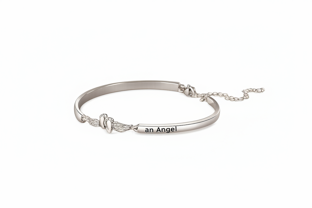 Silver bracelet with angel wing design and 'an Angel' engraving on a white background, branded 'Luwora'.